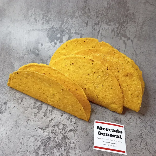 Yellow corn taco shells — GUSTO production, birdseye view